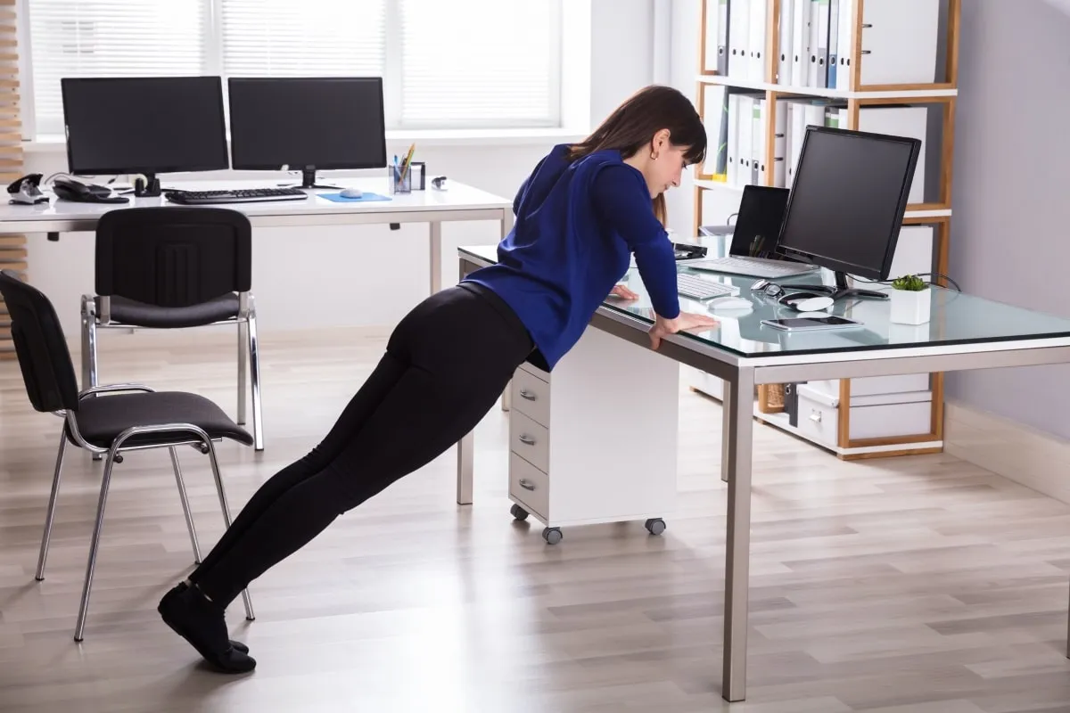 Professional reviewing calendar with movement reminders